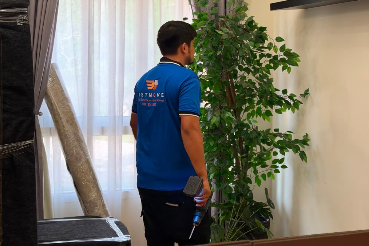 1stMove crew member preparing for a household move in Dubai