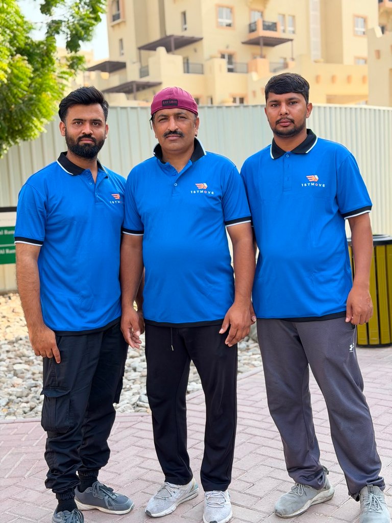 The real 1stMove moving crew standing together outdoors ahead of a move